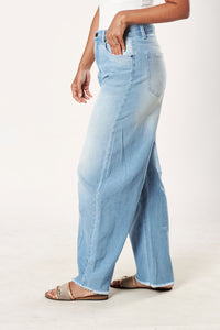 A Jean Come True: Mid Rise Horseshoe Jean Light Wash